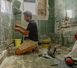 Person renovating a bathroom